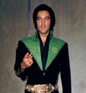 Taking the elevator and in the hallway near his dressing room in Las Vegas August 1971 3